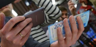 Эксперт рассказала, как проверить подлинность денег с помощью смартфона