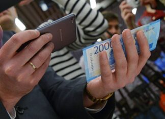 Эксперт рассказала, как проверить подлинность денег с помощью смартфона